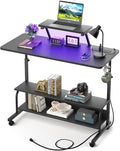 Height Adjustable Standing Desk with Power Outlets and LED Lights - 39" Manual Stand Up Desk with Monitor Stand and Storage Shelves Small Mobile Rolling Computer Desk Portable Laptop Table, Black by Besiost